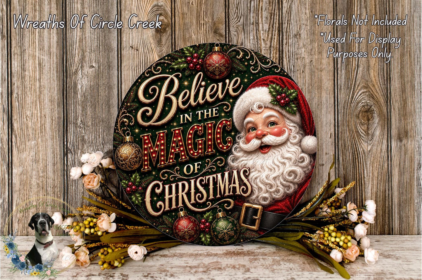 A decorative Christmas wreath with a Santa Claus face and the text "Believe in the Magic of Christmas" displayed on it, surrounded by ornaments and greenery.