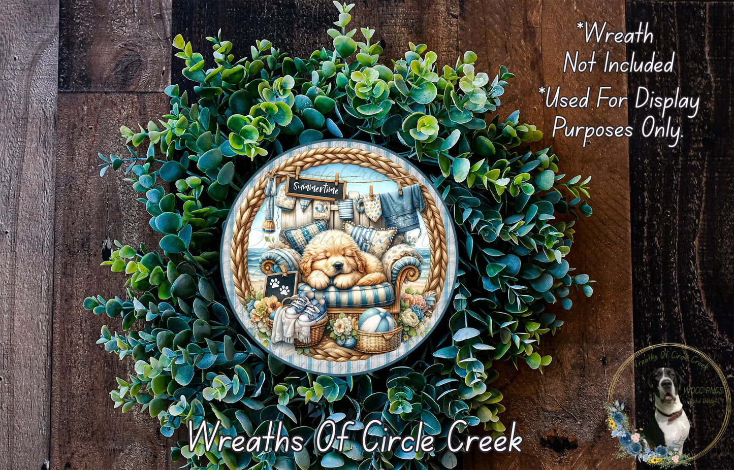 A wreath made of green foliage, featuring a central image of a dog and a sign that reads "Sconce". The wreath is displayed on a wooden surface, and there is text in the top right corner that reads "Wreath Not Included * Used For Display Purposes Only".
