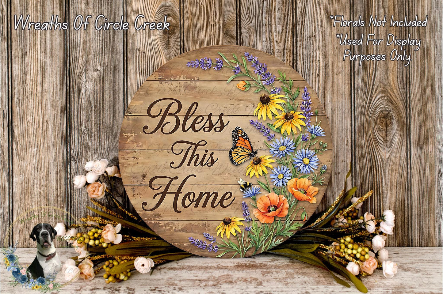 A wooden sign with the text "Bless This Home" surrounded by a floral arrangement and a butterfly.