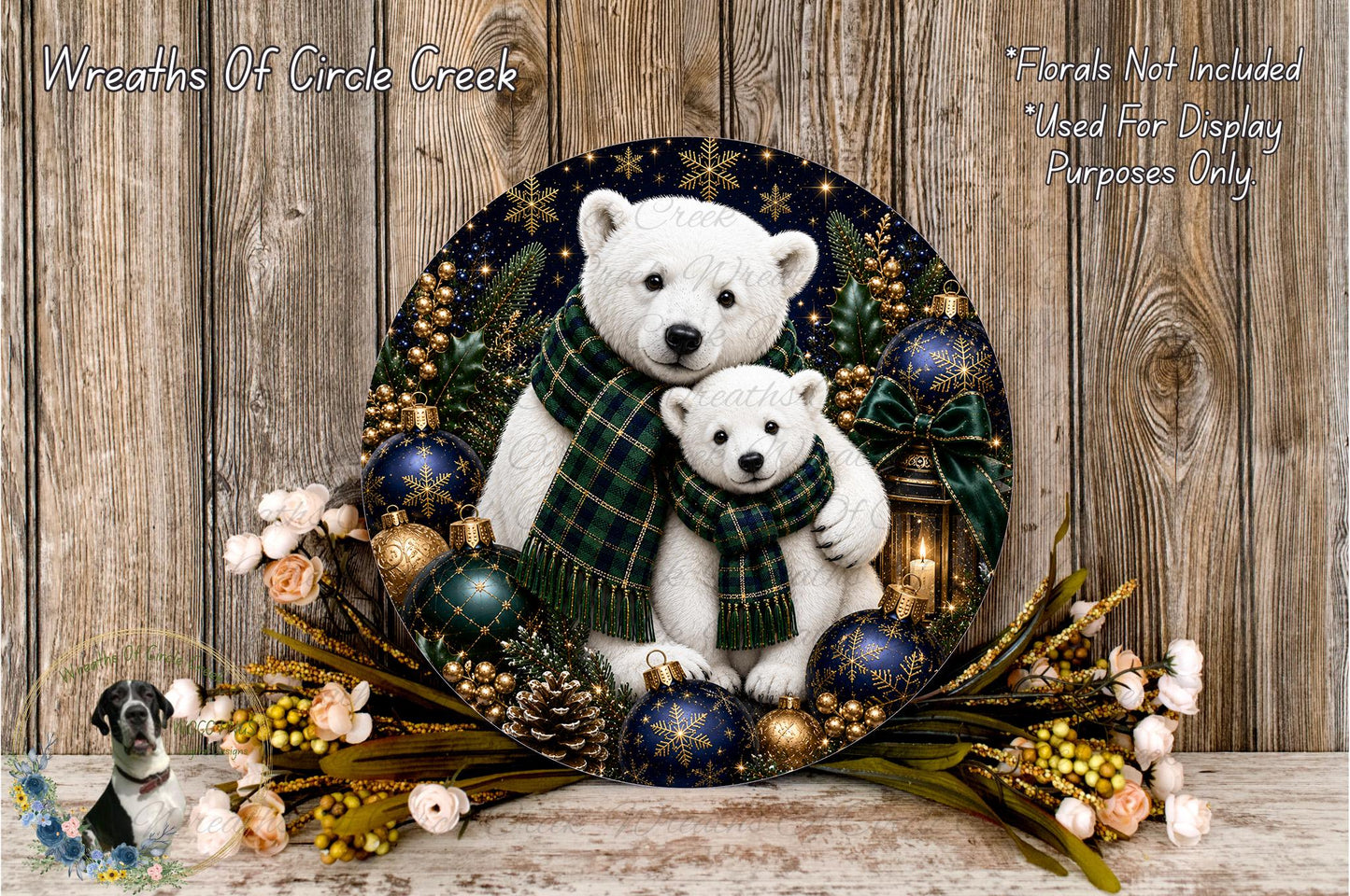 A decorative wreath featuring two white polar bears, one larger and one smaller, surrounded by various holiday ornaments and greenery. The wreath is placed on a wooden surface, and there are flowers and other decorative elements surrounding it.