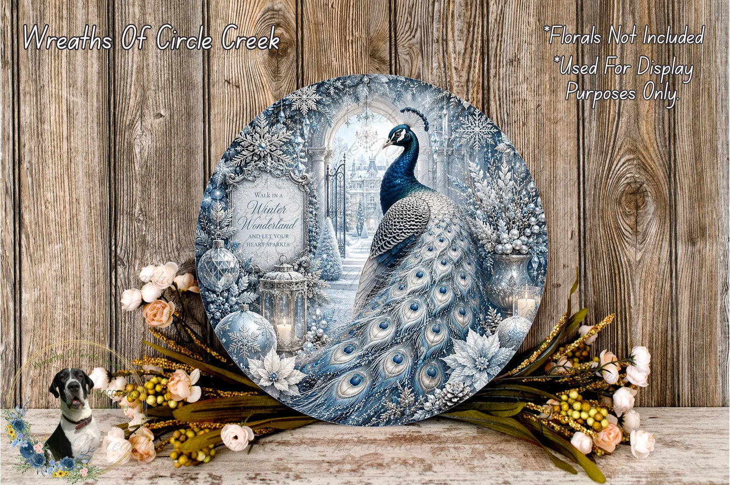 A decorative plate featuring a peacock surrounded by a winter wonderland scene, with a snowy landscape, trees, and flowers.