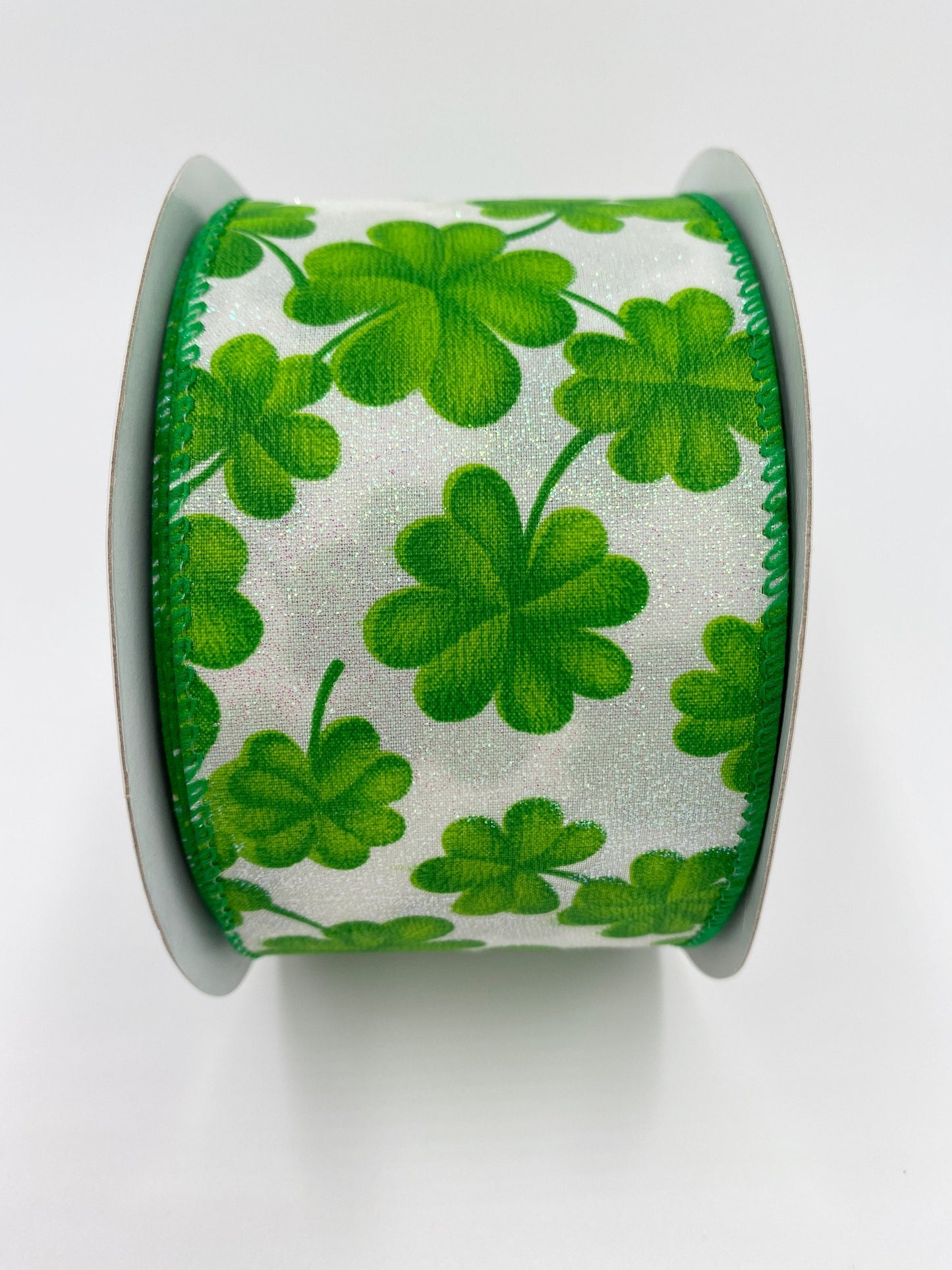 St. Patrick's Clover Ribbon, Iridescent Glitter On White, Green Clovers, Wired Edges, 2.5" X 20 YD.