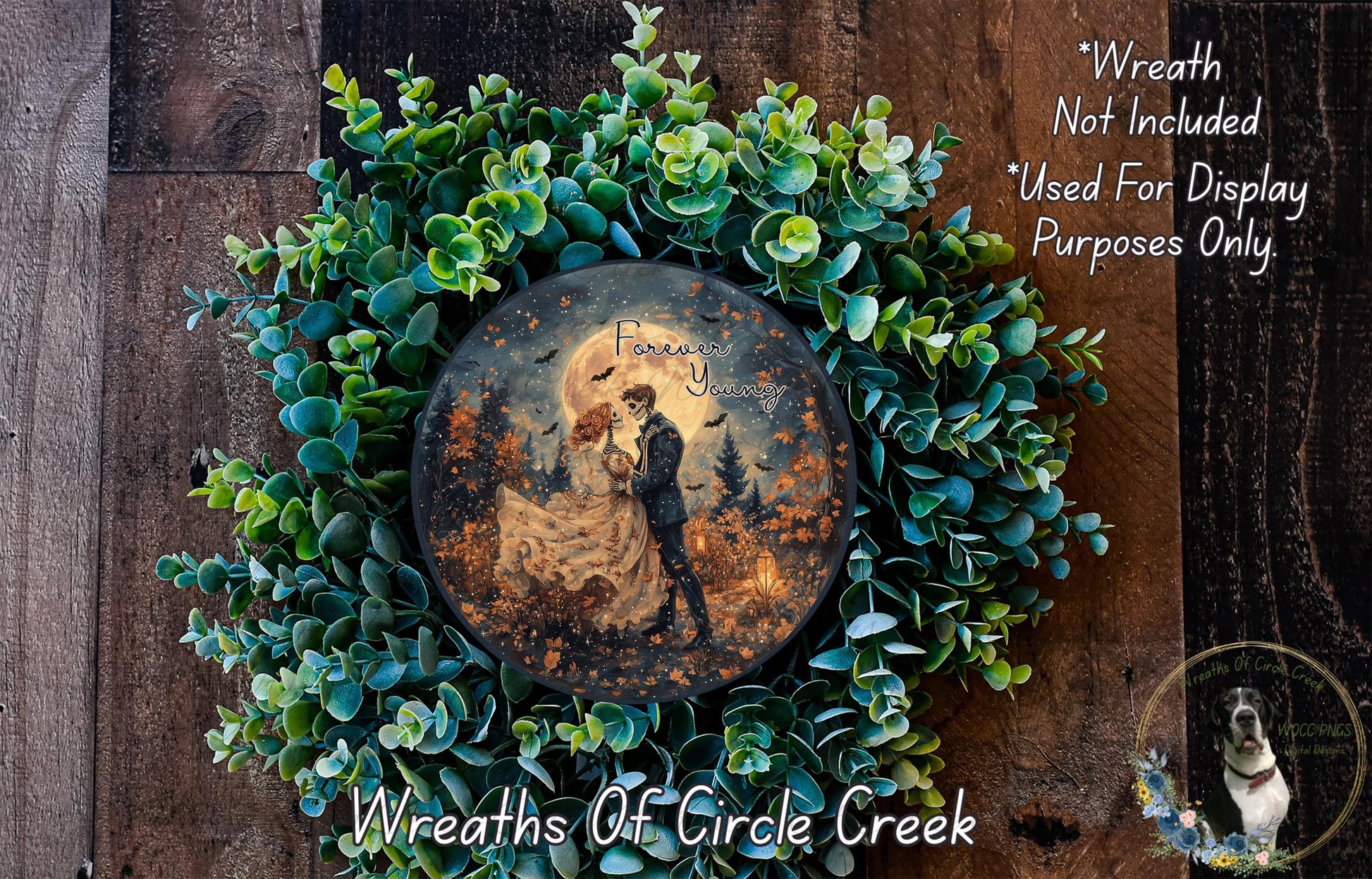 A wreath made of green leaves and flowers, with a circular plate featuring an illustration of a couple embracing in a forest setting.