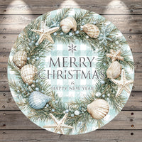 A round wreath with a festive design, featuring seashells, pine branches, and starfish. The wreath is surrounded by the text "MERRY CHRISTMAS & HAPPY NEW YEAR".