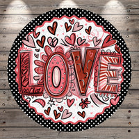 a circular design with the word "LOVE" prominently displayed in the center. The design is surrounded by various heart shapes in shades of pink and red, creating a vibrant and festive atmosphere.