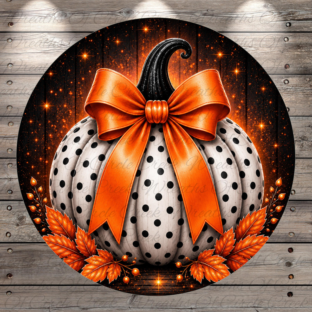 A large, white pumpkin with black polka dots and an orange ribbon bow is displayed against a dark background with orange and white lights.