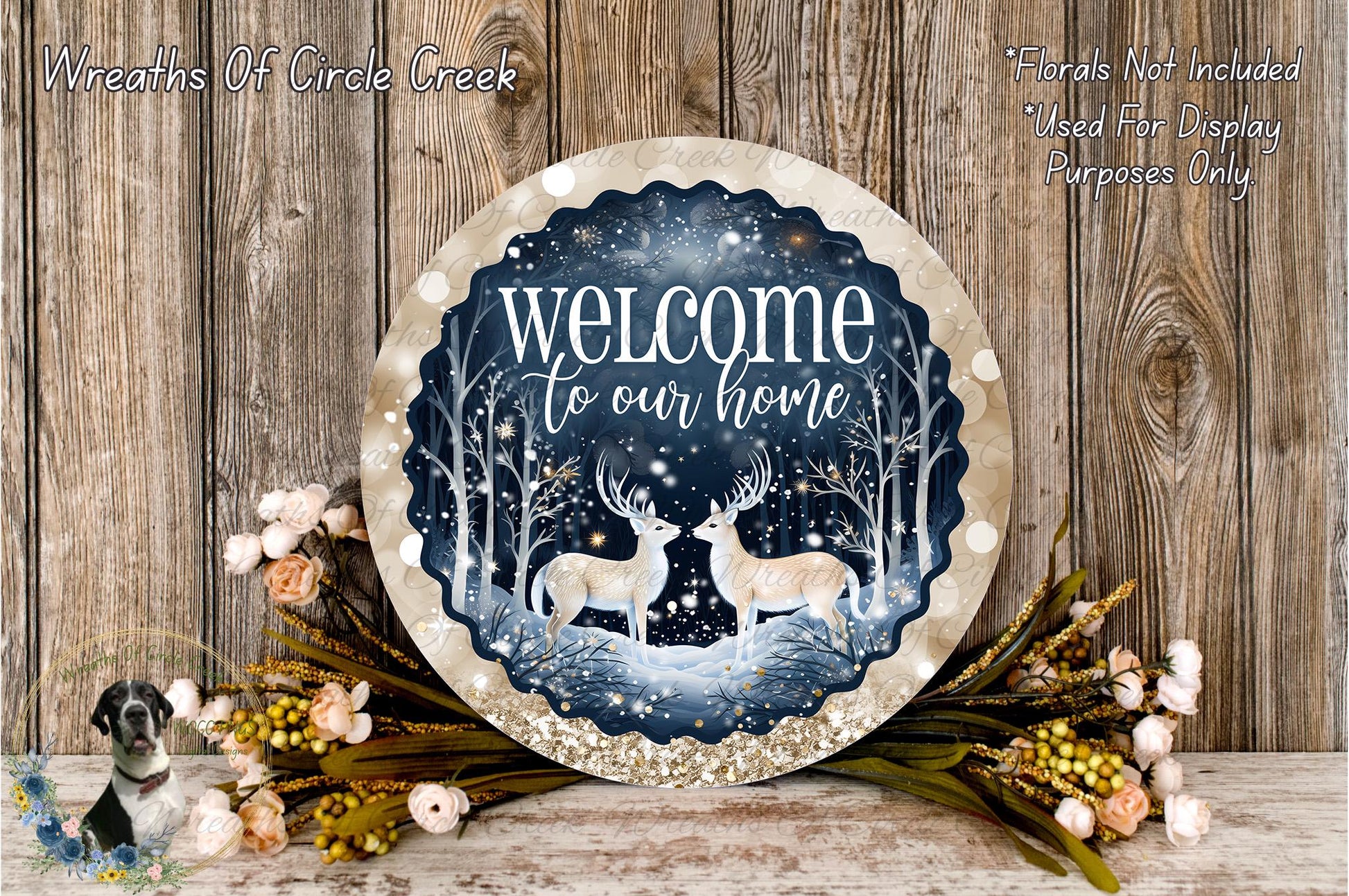 a round sign with a winter scene, including two deer, surrounded by flowers and foliage. The sign reads "Welcome to our home".
