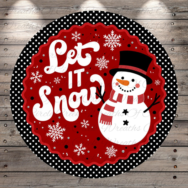 A snowman wearing a top hat and scarf, with the text "Let it snow" written on a red background with white polka dots.