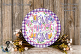 a decorative sign with the text "Home Sweet Home" surrounded by a floral arrangement and a wooden background.