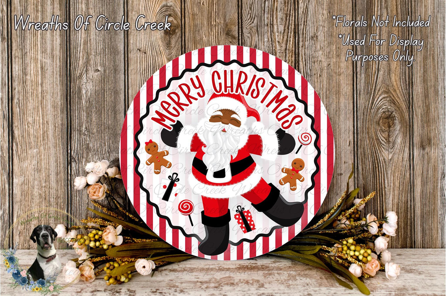 A festive Christmas wreath with a Santa Claus figure, surrounded by flowers and other holiday decorations.