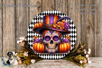 a decorative skull wearing a colorful hat, surrounded by pumpkins and flowers, with a black and white checkered border.