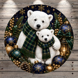 A festive Christmas scene featuring two white polar bears, one larger and one smaller, surrounded by ornaments, pine cones, and a lantern, all set against a dark night sky with snowflakes.