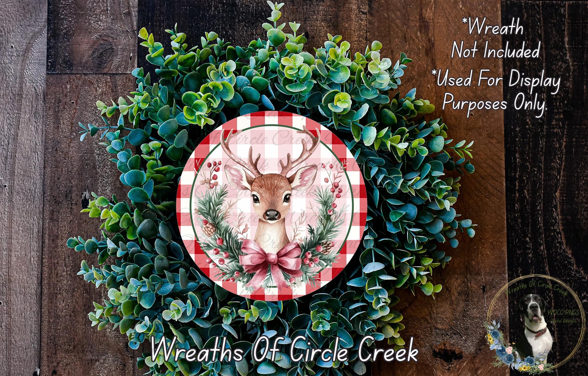 A wreath made of green foliage and a red and white checkered plate featuring a deer head, with the text "Wreath Not Included * Used For Display Purposes Only" and "Wreaths Of Circle Creek" below the image.