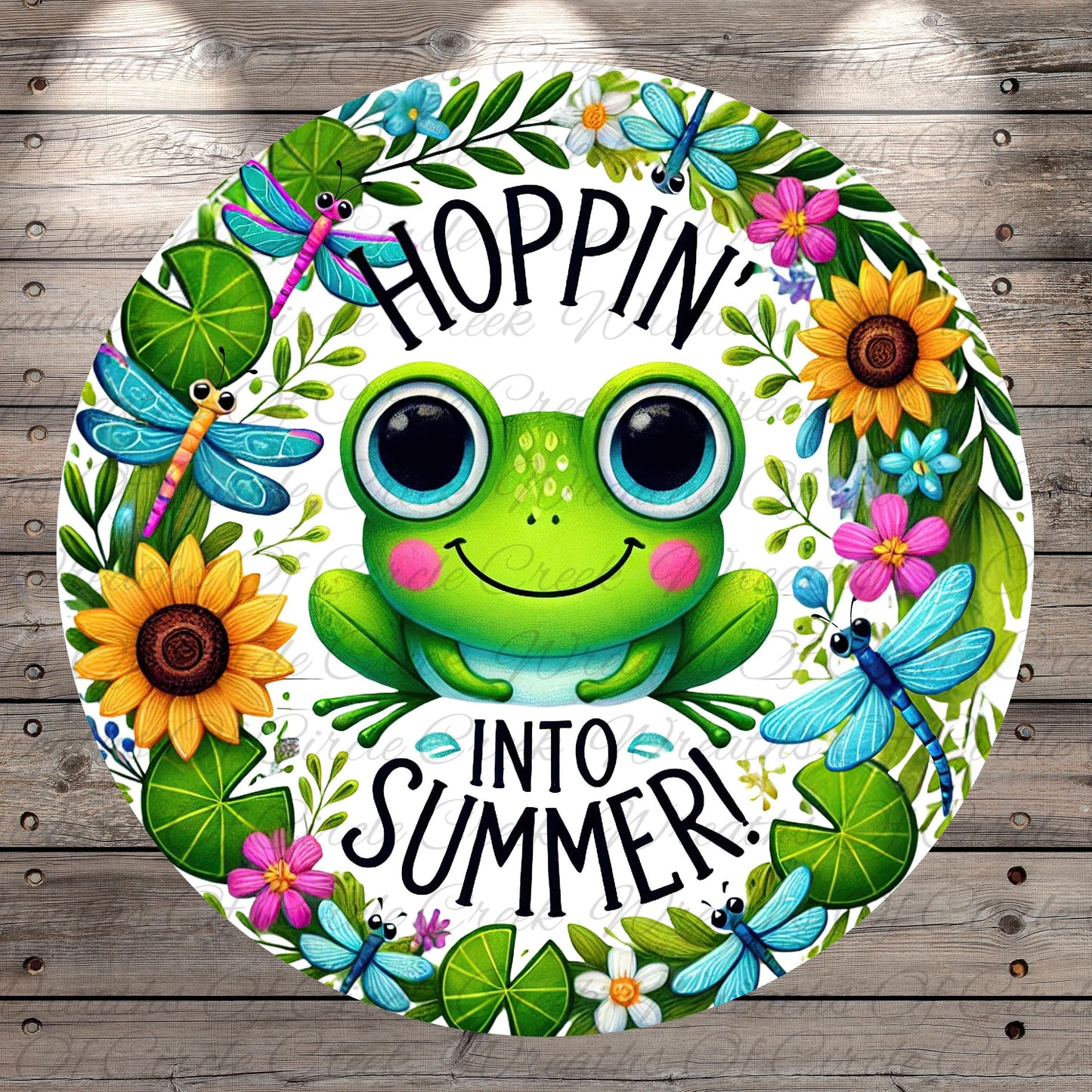 a sticker with a frog and flowers on it