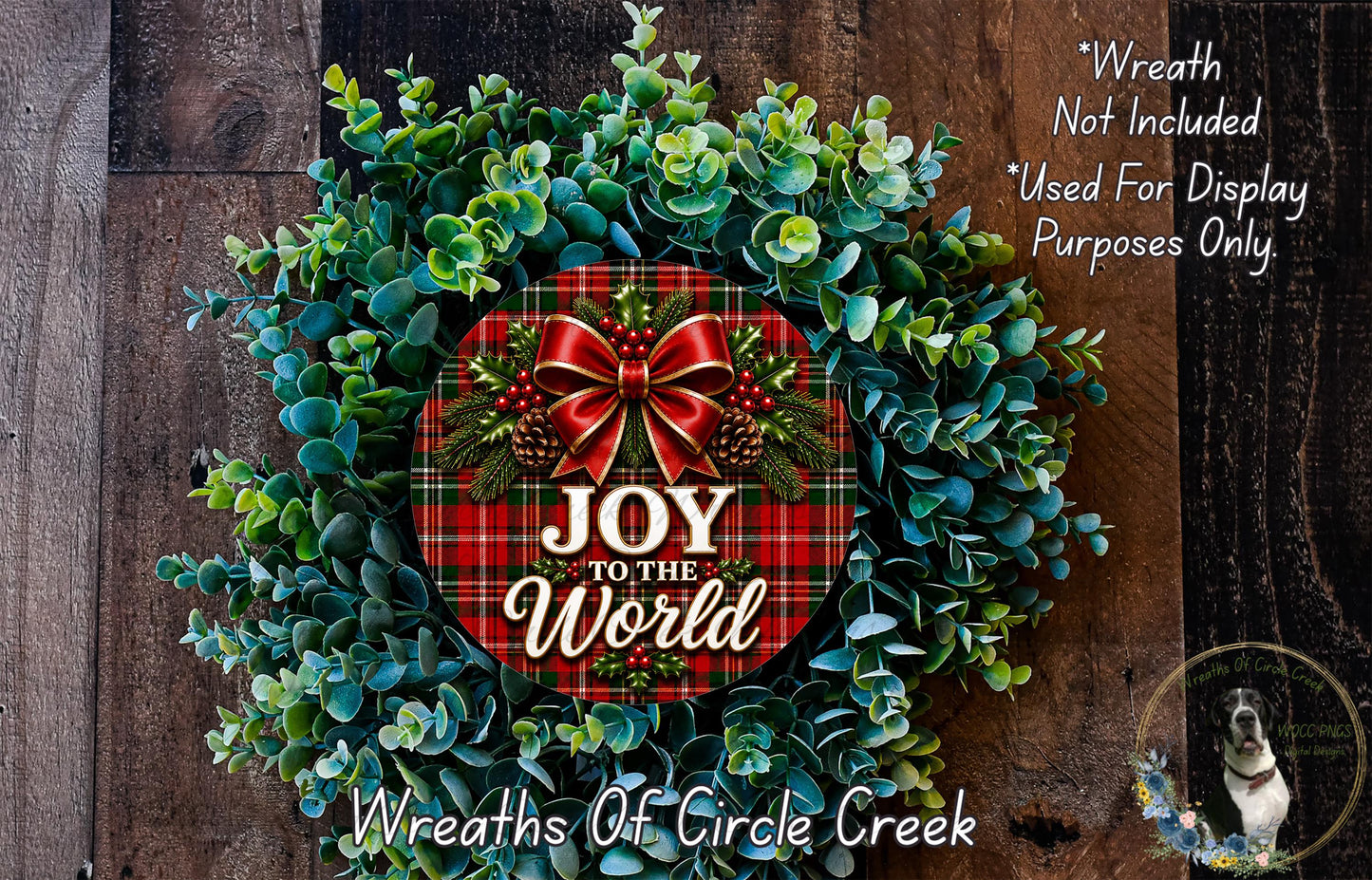 a Christmas wreath with a red bow and the text "Joy to the World" on it, surrounded by greenery.