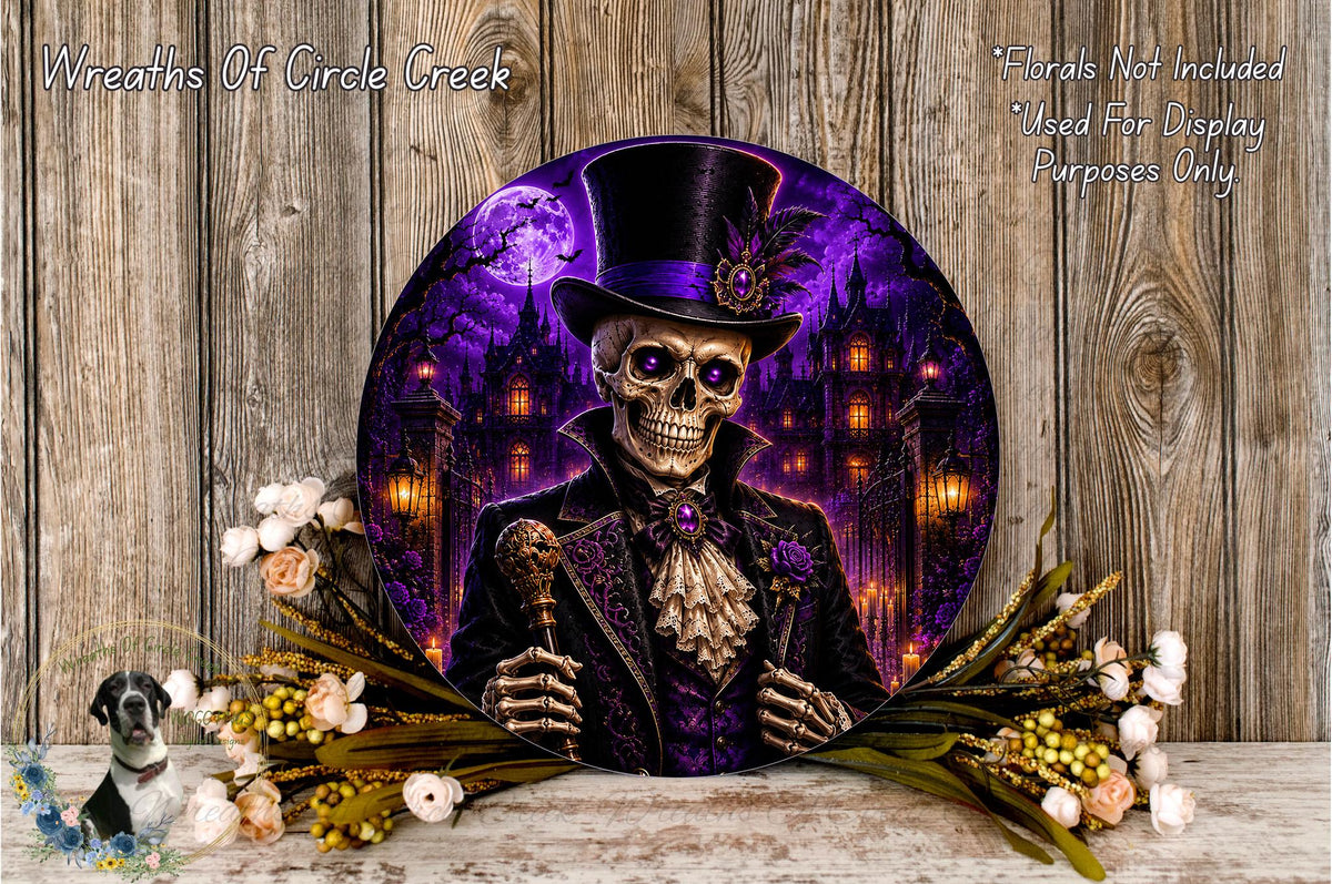 a skull wearing a top hat and holding a cane, surrounded by a wreath of flowers and a wooden background.