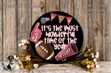 A decorative wreath with various football-related items, including a football, a cheerleader, and a football trophy, along with the text "It's the most wonderful time of the year" and "GET TEAM!"