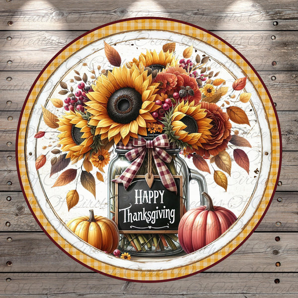 A circular arrangement featuring a jar filled with sunflowers, autumn leaves, and a pumpkin, with the text "Happy Thanksgiving" displayed on the jar.