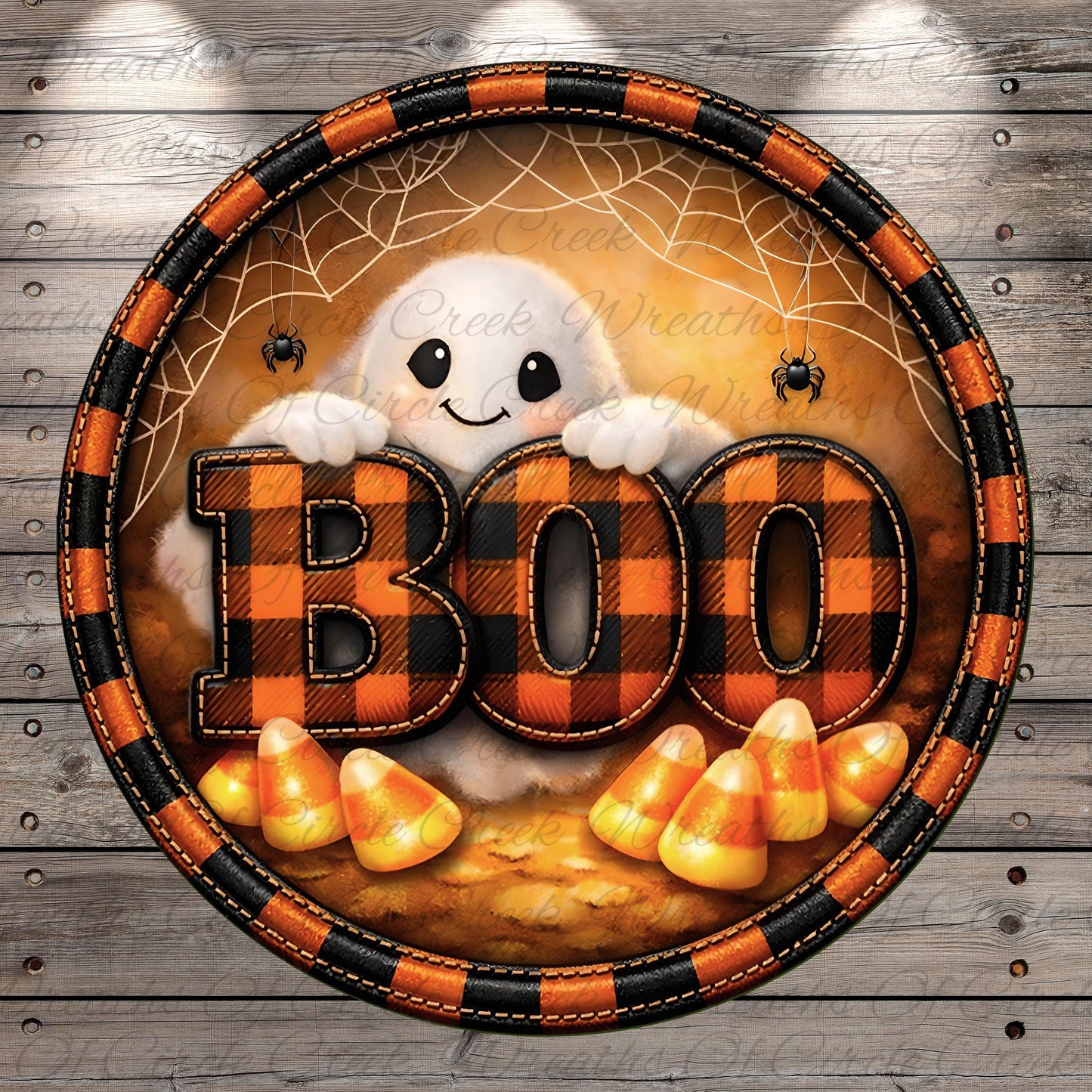 A Halloween-themed graphic design featuring a ghost, candy corn, and the word "BOO" in a circular frame with a checkered pattern.