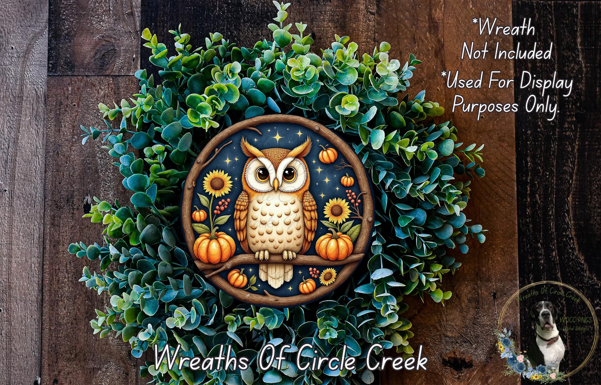 A wreath featuring an owl surrounded by autumnal elements such as pumpkins, sunflowers, and pine cones, set against a backdrop of greenery.