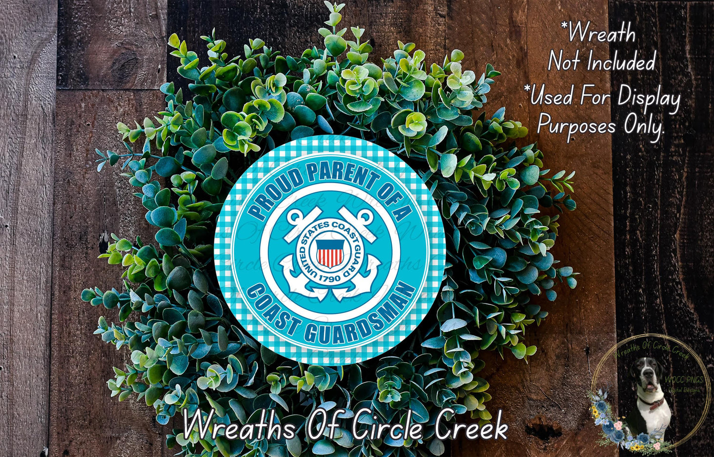 A wreath made of green leaves and a blue and white circular emblem, with the text "Proud PARENT OF A COAST GUARDMAN" and "Wreaths of Circle Creek" displayed on it.