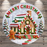 A festive Christmas scene featuring a gingerbread house with a gingerbread man, surrounded by snow, trees, and a wreath. The text "Merry Christmas" is displayed above the gingerbread house.