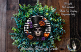 A wreath featuring a woman's face with a skull design, surrounded by green foliage and orange flowers.