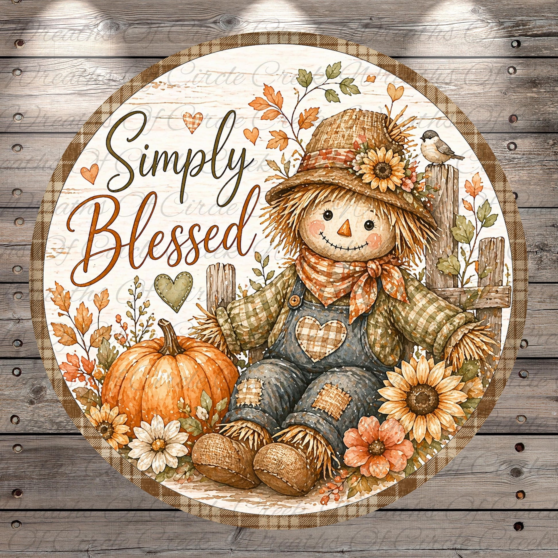 A round, decorative image featuring a scarecrow, a pumpkin, and flowers, with the text "Simply Blessed" written on it.