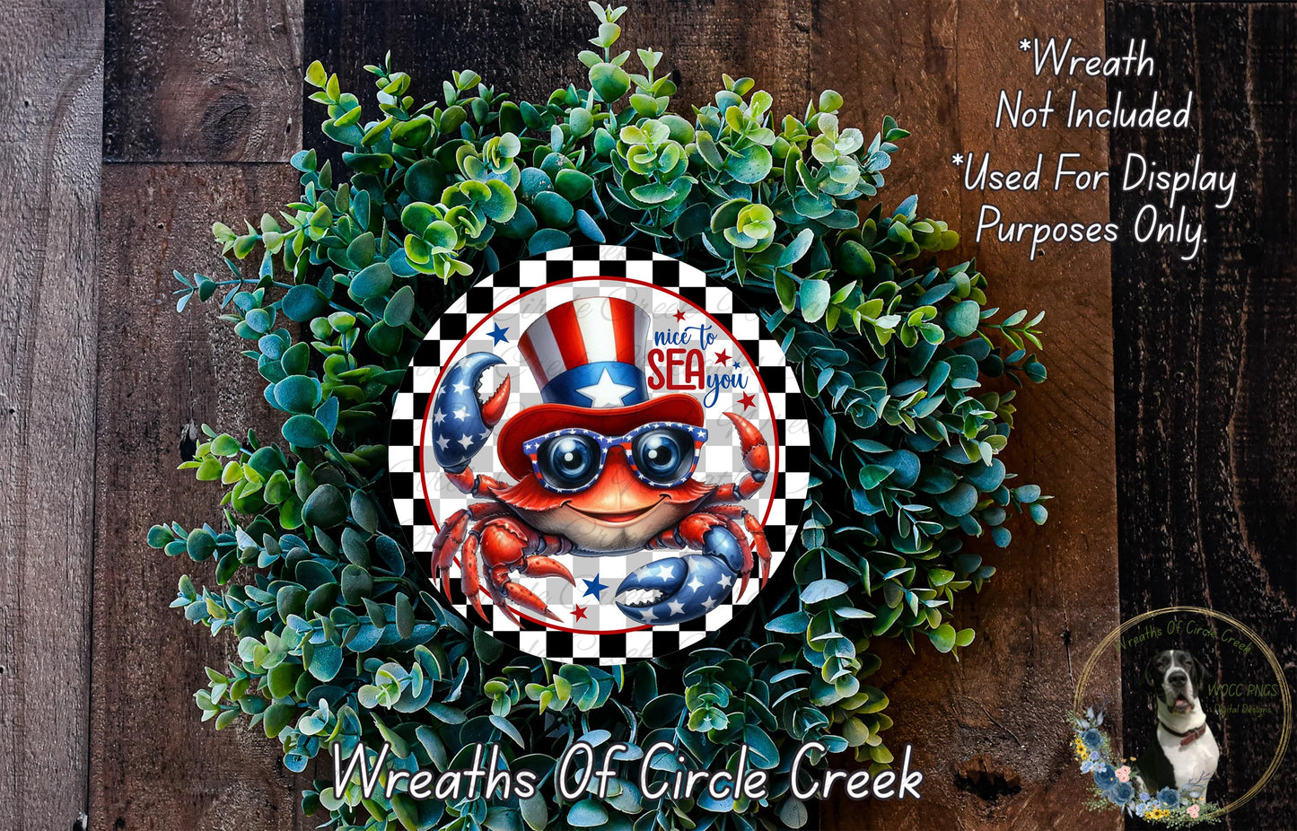 A wreath made of green leaves and a red and white crab wearing sunglasses, with a patriotic theme.