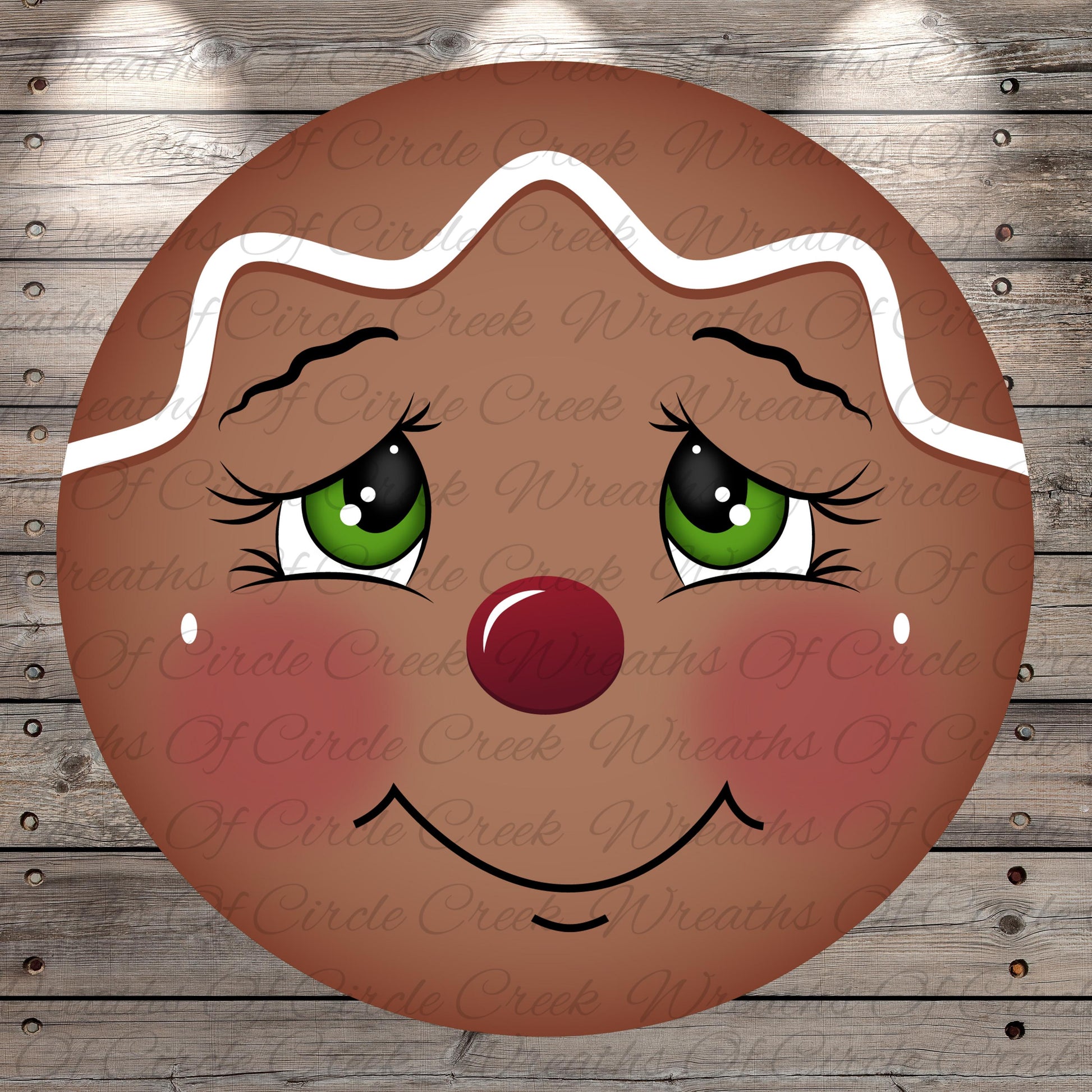 A close-up of a gingerbread man's face with a red nose, green eyes, and a big smile, set against a wooden background.