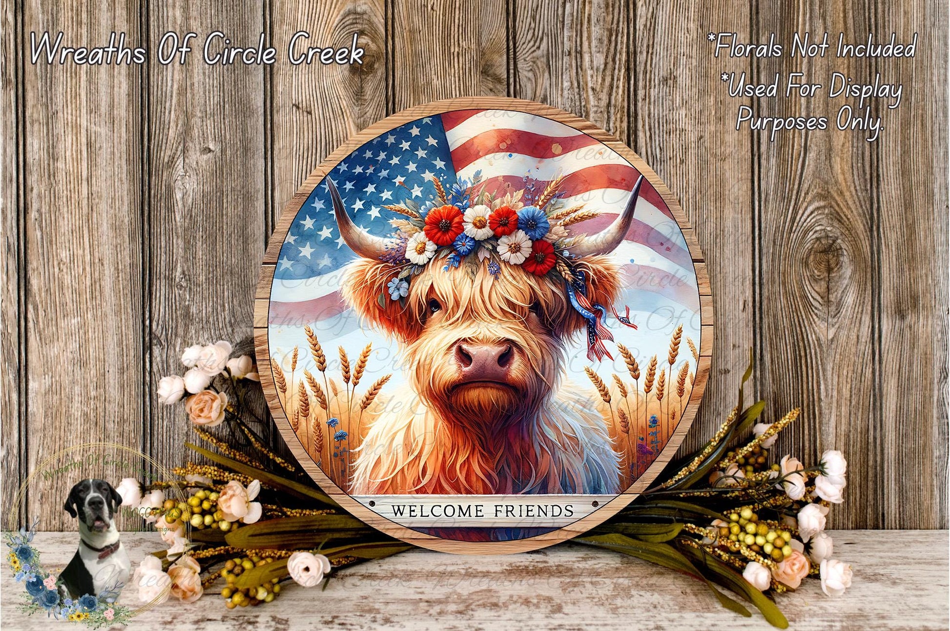 A wooden sign with a cow wearing a flower crown and surrounded by flowers, with an American flag in the background.