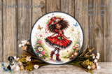 A decorative plate featuring a whimsical illustration of a young girl with curly hair, wearing a red dress and a red hat, surrounded by flowers and butterflies.