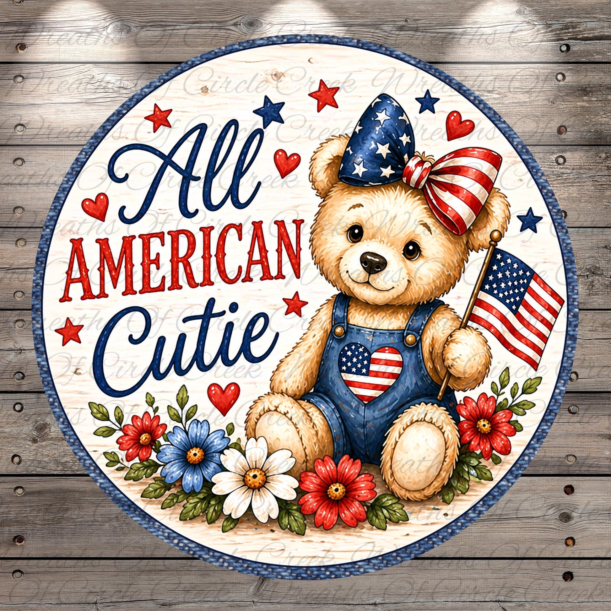 A teddy bear wearing a patriotic outfit and holding an American flag, surrounded by flowers and stars, with the text "All American Cutie" written on it.