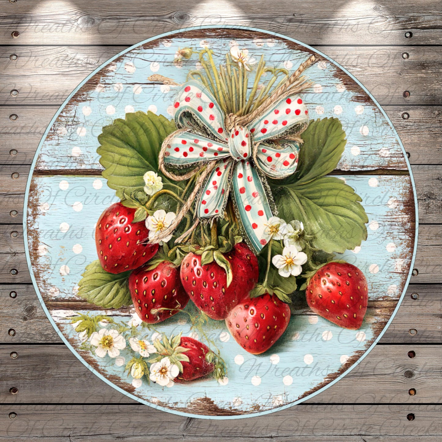 A round wooden plate with a blue and white polka dot pattern, featuring a bunch of red strawberries with white flowers and green leaves.
