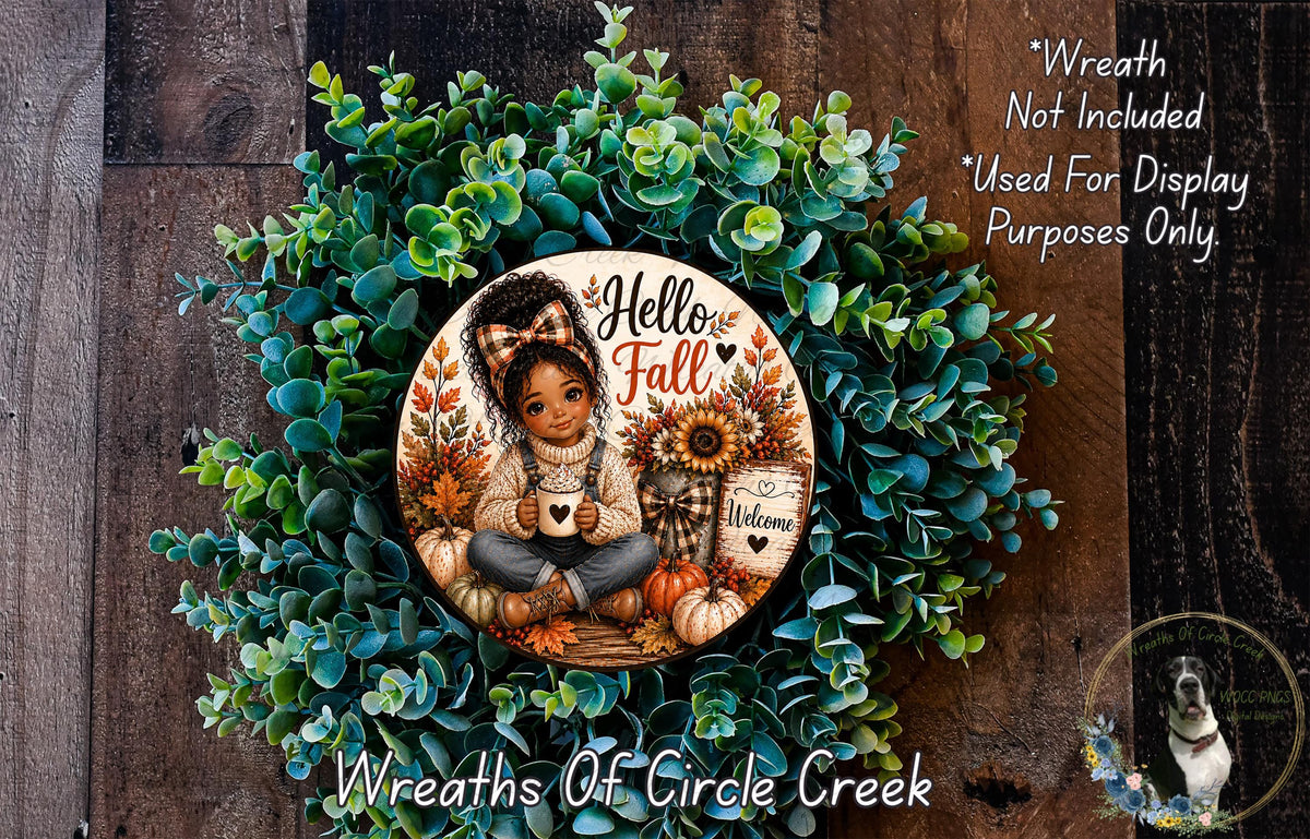 A wreath made of green leaves and flowers, with a central image of a young girl sitting and holding a coffee mug. The wreath is surrounded by text that reads "Hello Fall Welcome" and "Wreaths of Circle Creek".