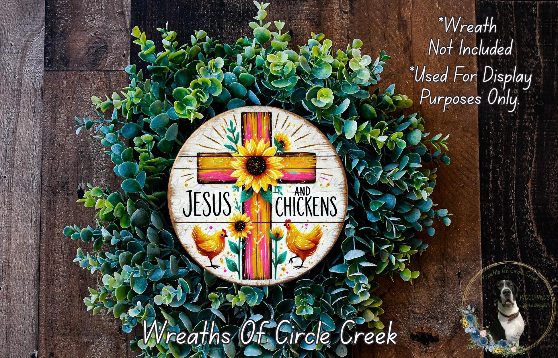 a wreath with a cross and flowers on it