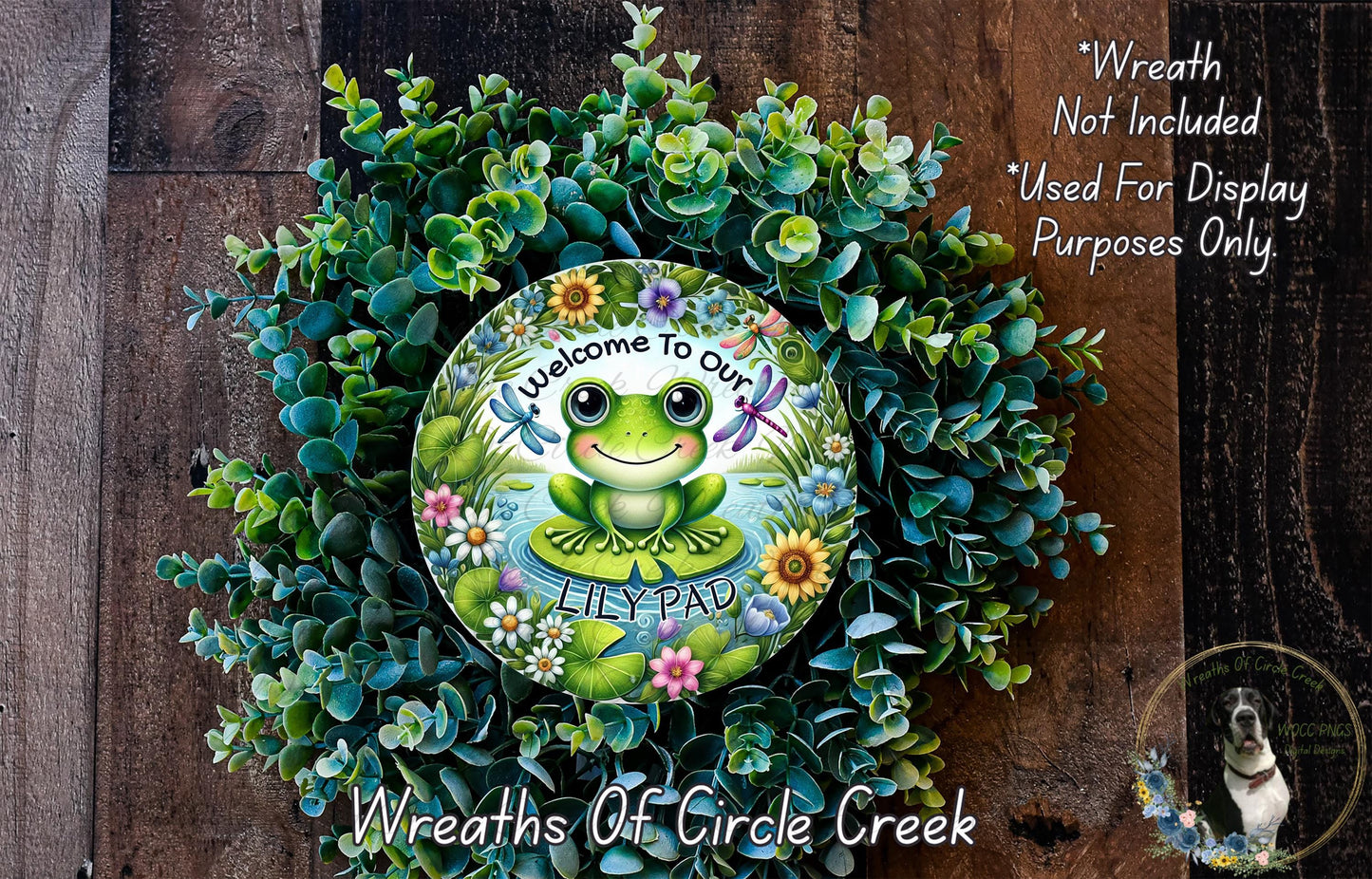 a wreath with a frog painted on it