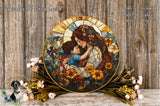 a large, ornate, and colorful stained glass-style plate depicting a woman embracing a child, surrounded by a floral arrangement.