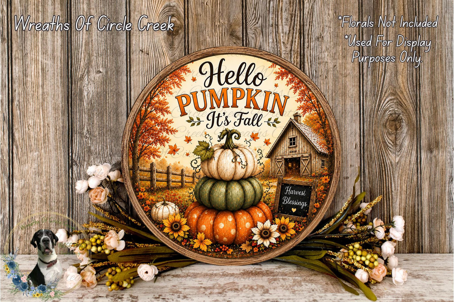 A decorative round sign with the text "Hello Pumpkin It's Fall" and an illustration of a pumpkin stack, surrounded by fall foliage and flowers.