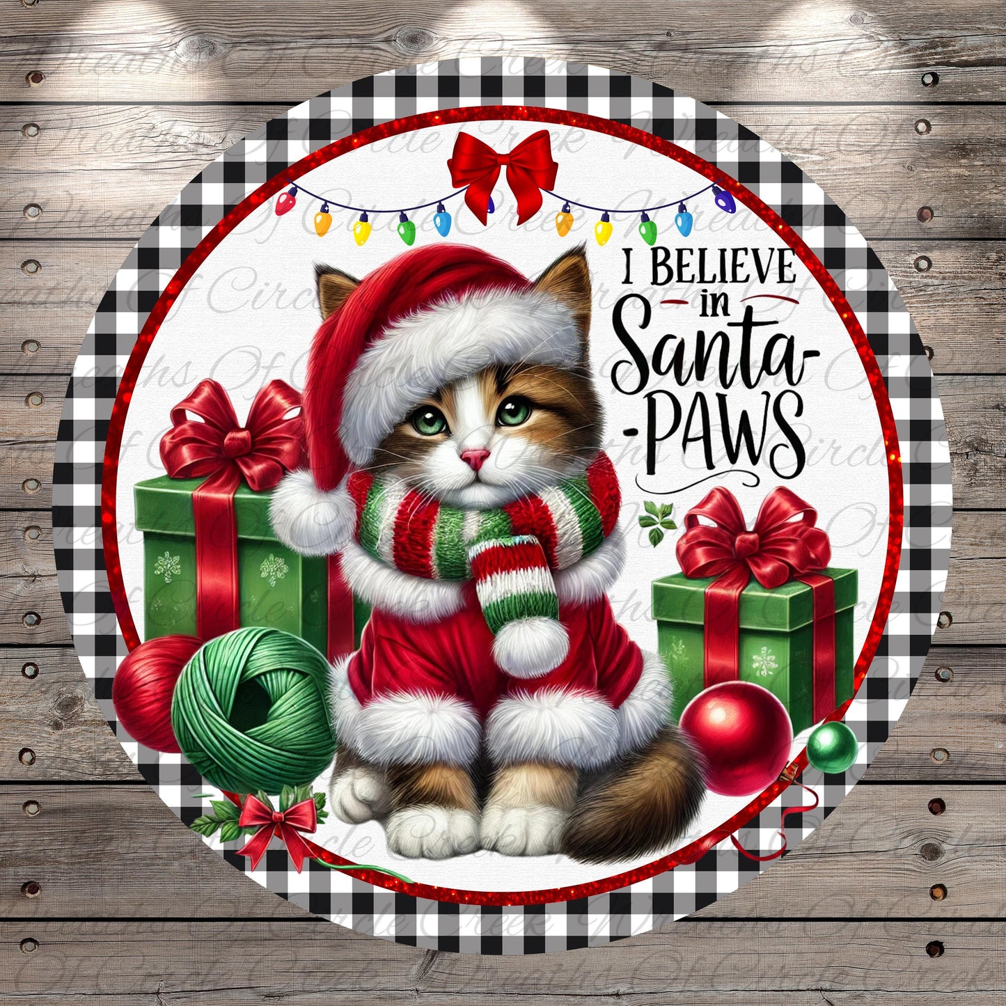 A cat wearing a Santa hat and scarf, surrounded by Christmas decorations such as presents, ornaments, and lights, with the text "I Believe in Santa Paws" displayed.