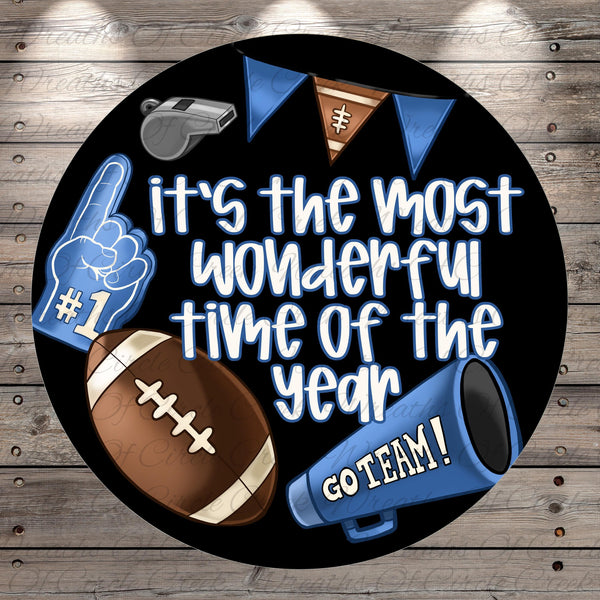 The image is a circular graphic with various football-related elements, including a football, a whistle, and a cheerleader, along with the text "It's the most wonderful time of the year" and "GO TEAM!"