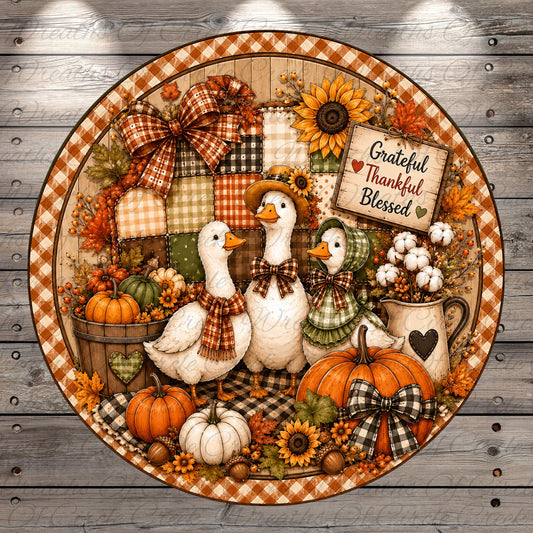 A decorative collage featuring a group of ducks surrounded by autumn-themed elements such as pumpkins, sunflowers, and a "grateful thankful blessed" sign.