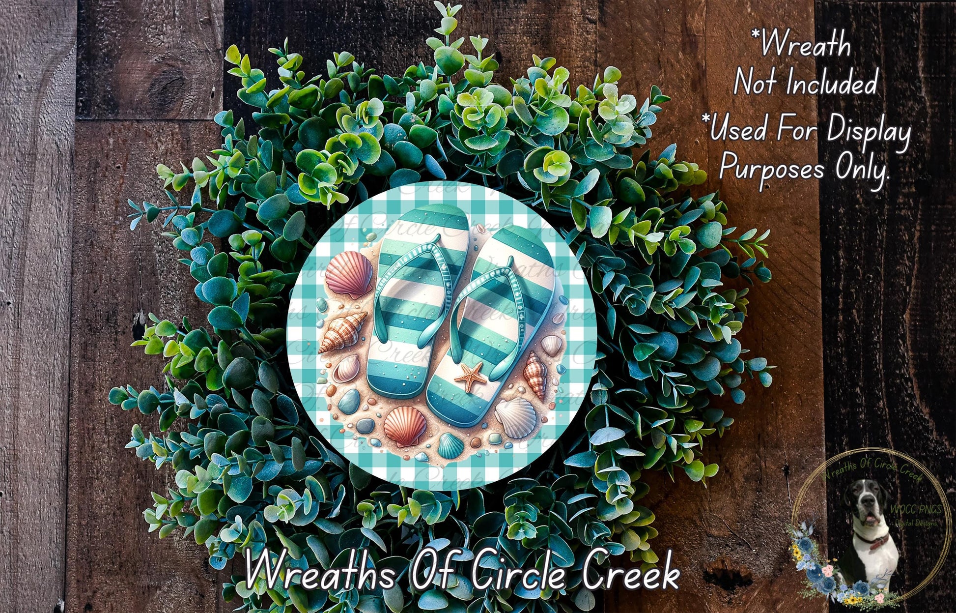 A wreath made of green foliage and seashells, with a pair of flip flops placed on top of the wreath.