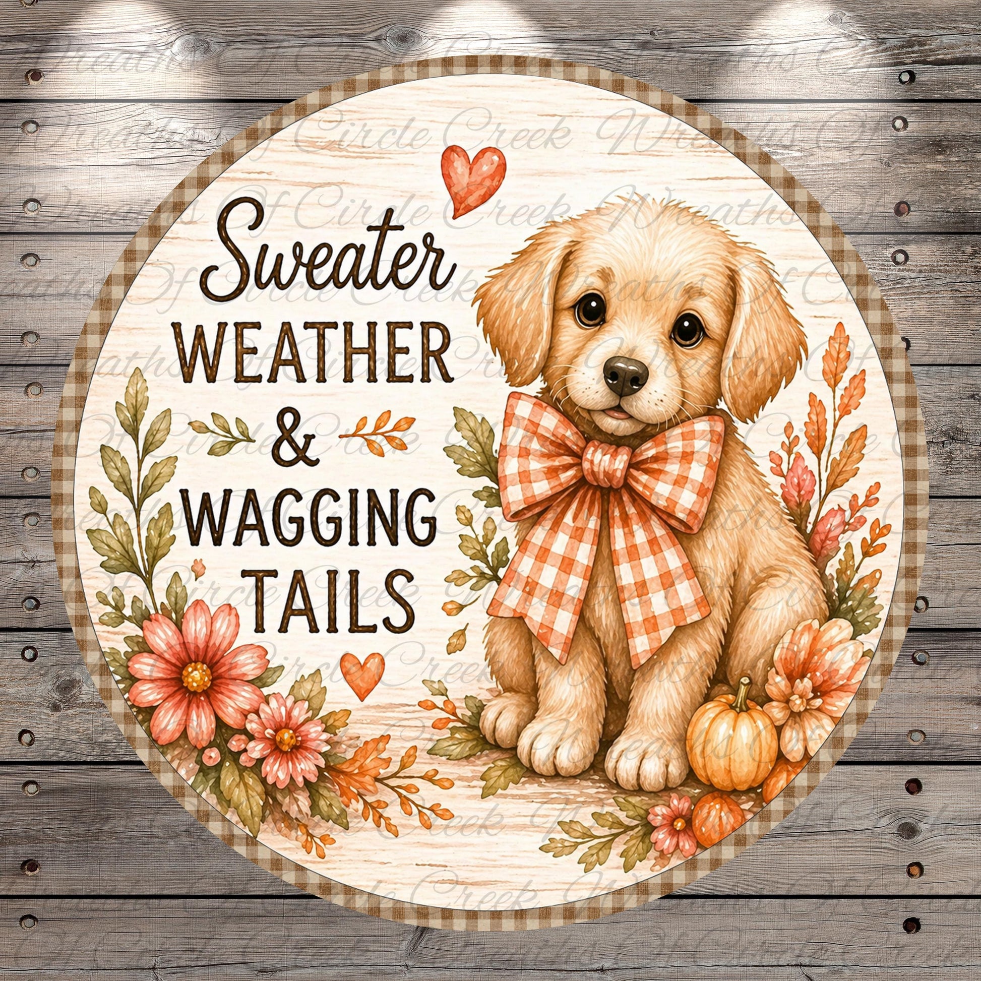 A cute golden retriever puppy wearing a plaid bow tie, surrounded by autumn-themed elements such as flowers and pumpkins, with the text "Sweater Weather & Wagging Tails" displayed on the image.