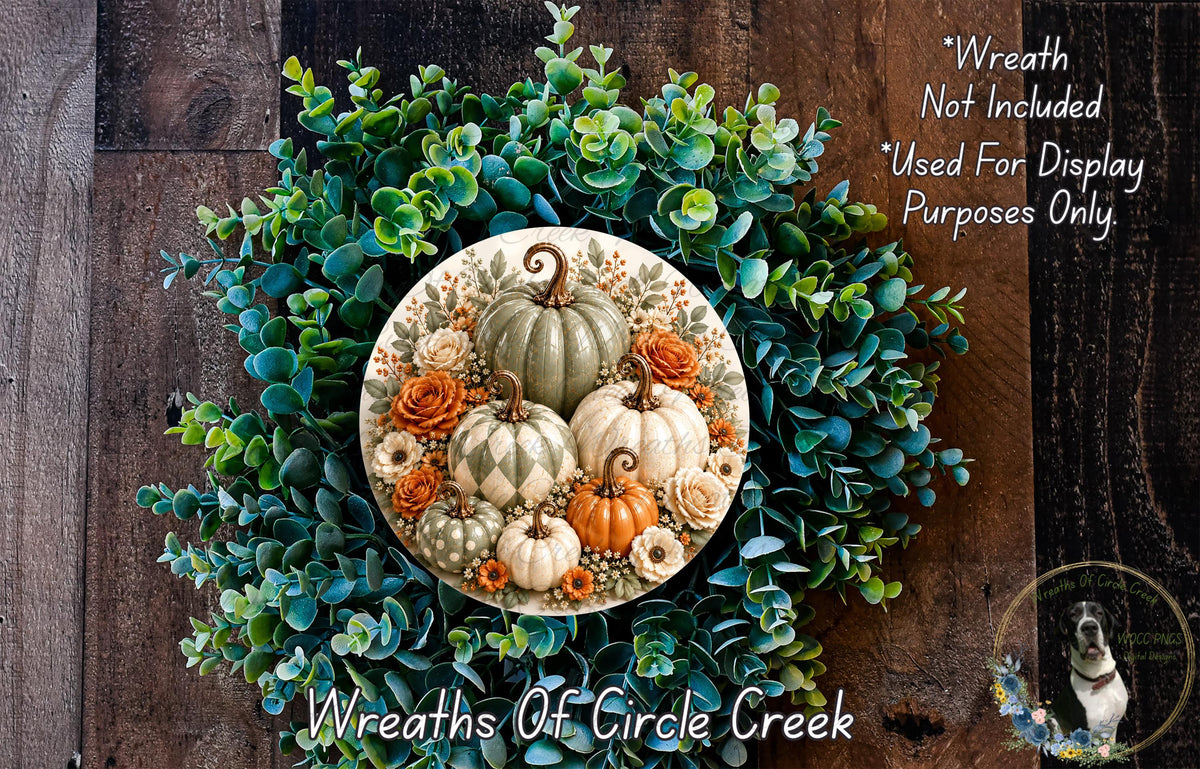 a wreath made of various fall-themed elements, including pumpkins, greenery, and flowers, set against a wooden background.