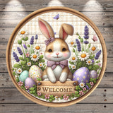 A round wooden sign with a cartoon rabbit sitting in front of a floral arrangement of Easter eggs and flowers, with the word "Welcome" written on it.