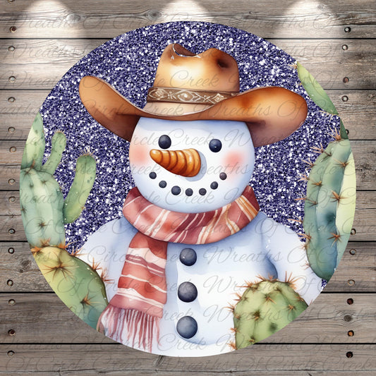 A snowman wearing a cowboy hat and scarf, surrounded by cacti, is depicted in the image.