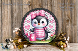 A decorative wreath featuring a cute penguin wearing a pink bow and holding a pink watering can, surrounded by flowers and greenery.
