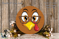 A round wooden sign with a cartoon turkey face wearing glasses and a red beak, surrounded by flowers and a wooden background.