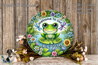 a green frog sitting on top of a wooden table
